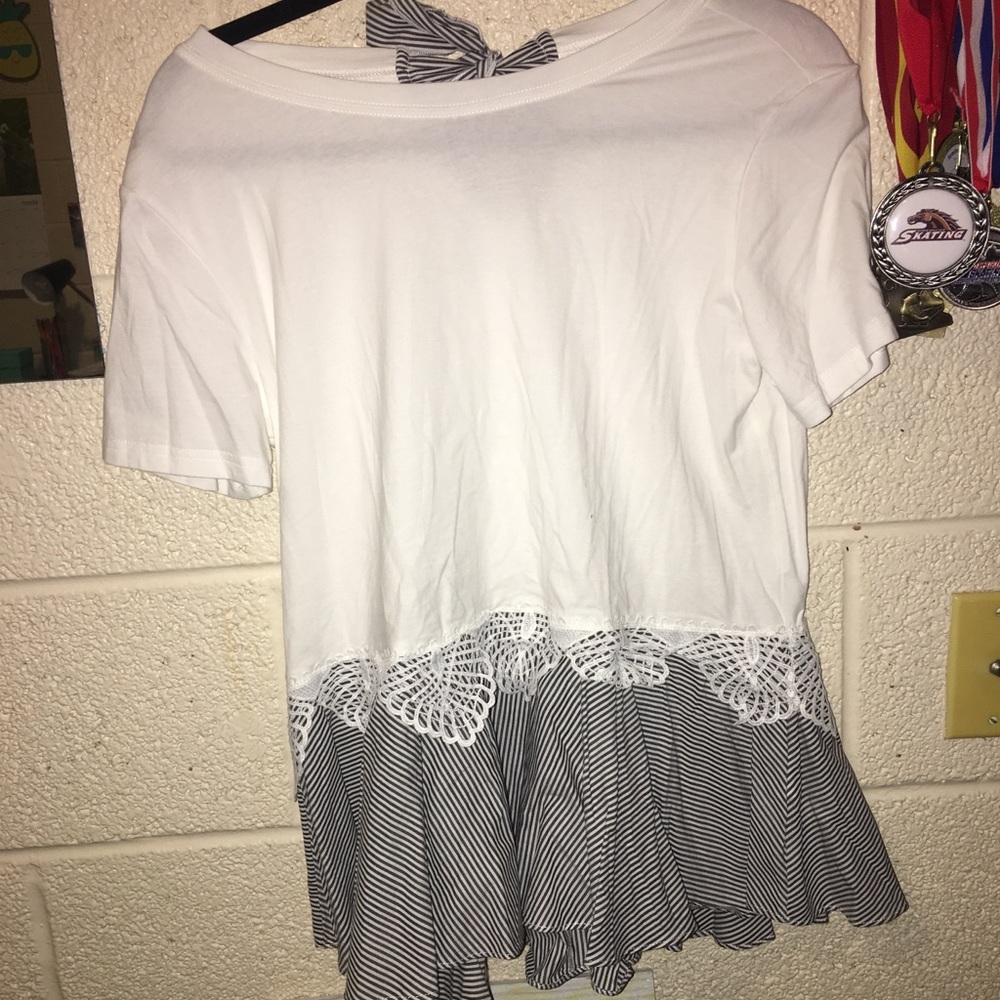 Cute top with peplum/crochet/striped detailing